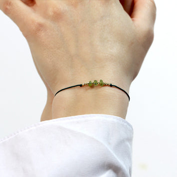 Bratara din aur galben de 14K si Peridot